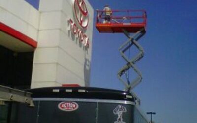 Commercial building exterior being cleaned